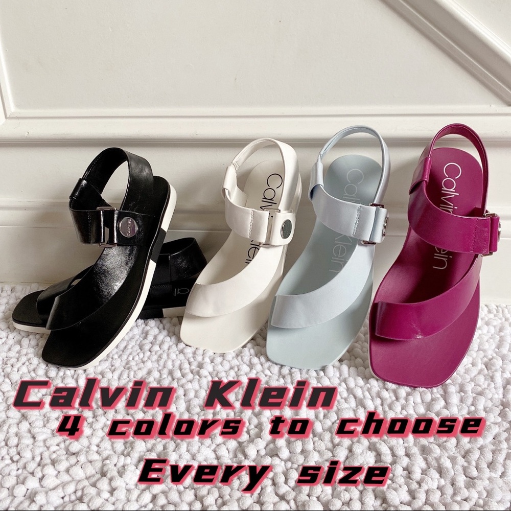 Calvin Klein
Women's Rikki Flat Sandals. 4 colors
